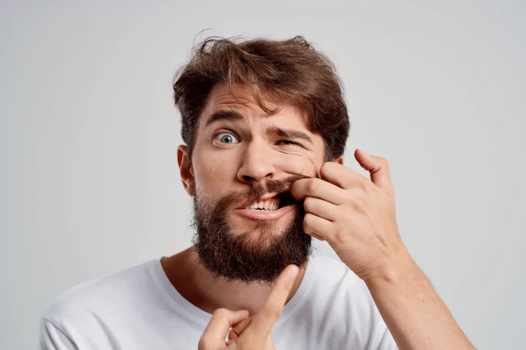 Man experiencing tooth pain